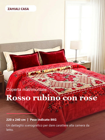 Coperta matrimoniale rosso rubino con bouquet di rose in camera da letto